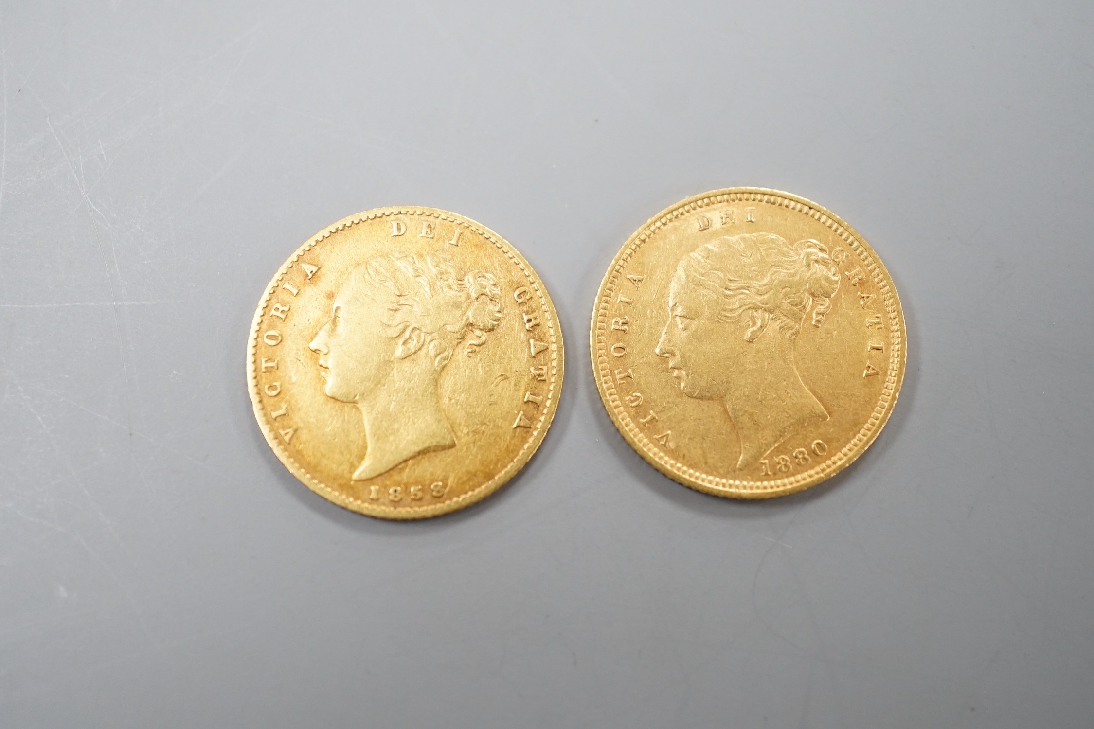 Two Victoria gold half sovereigns, 1858 & 1880.